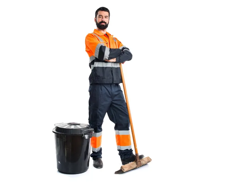 man-in-a-toilet-suit-posing-next-to-a-broom-and-garbage-pail