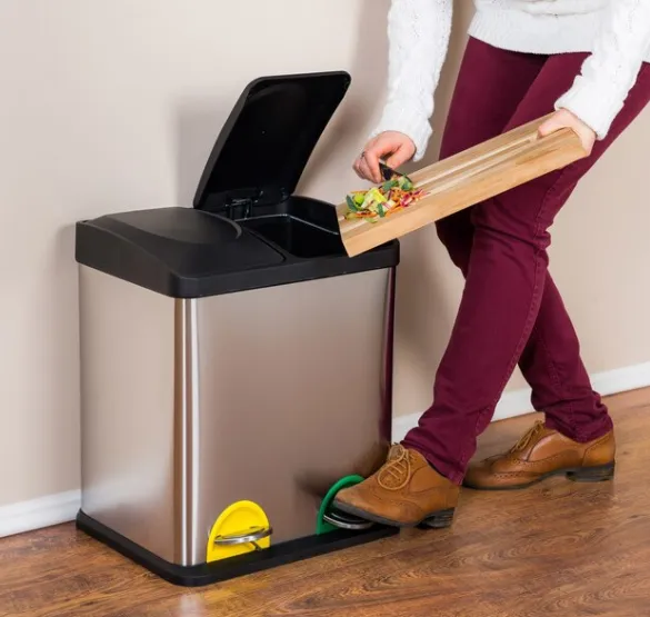person throwing food scraps into smart trash can